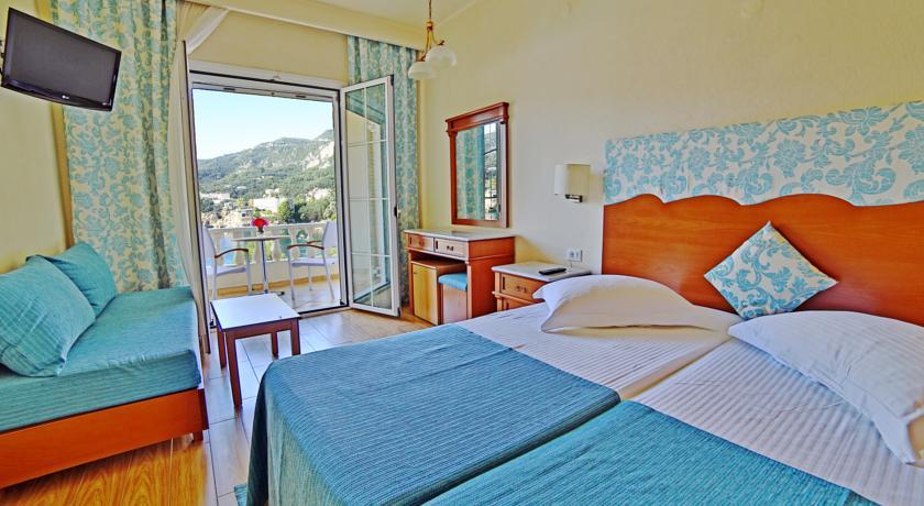 อโครติริ บีช Hotel ปาเลโอกัสไตรซา ภายนอก รูปภาพ A typical hotel room